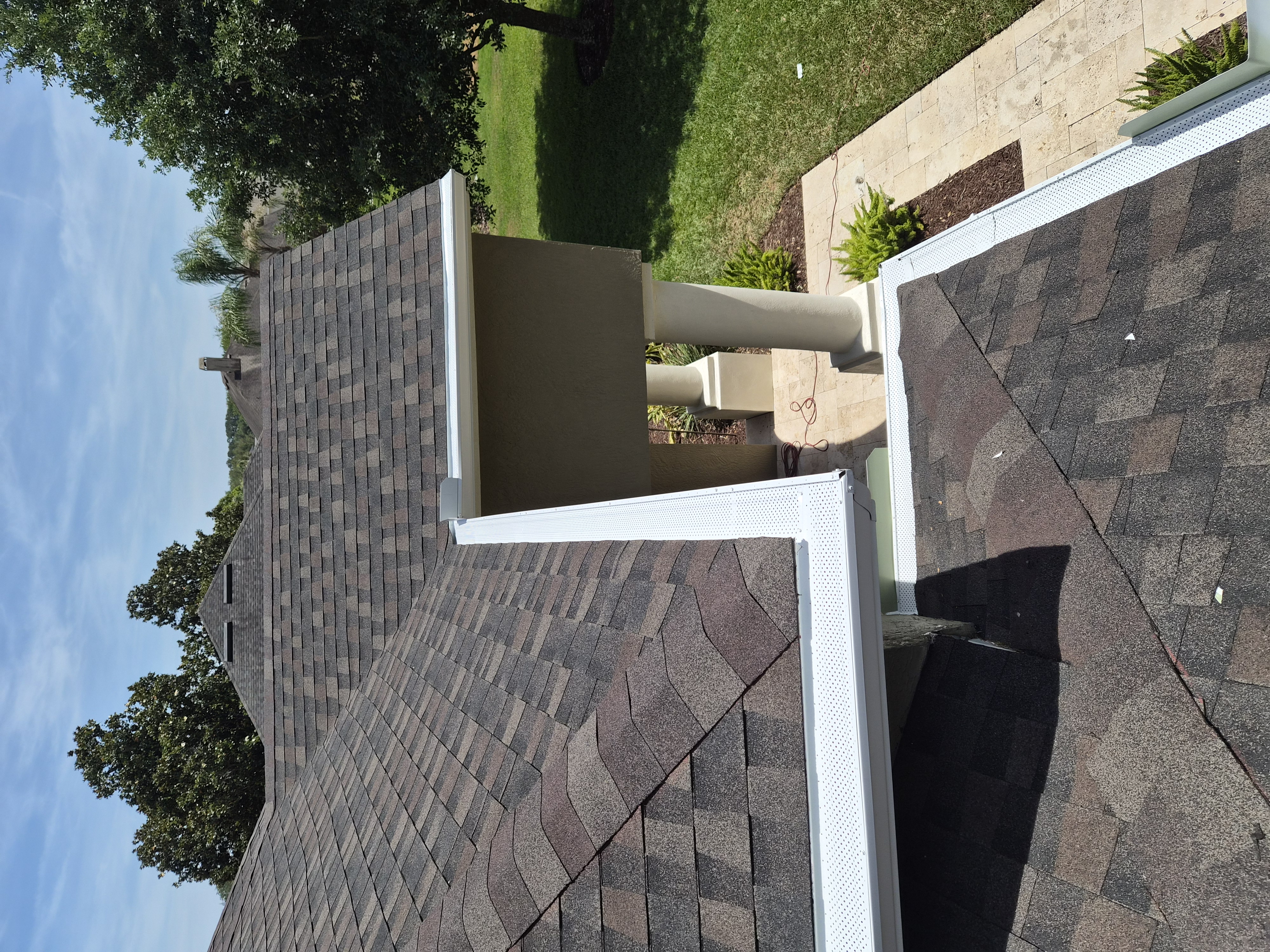 Gutter guard mesh system installed on roof by M12 Gutters