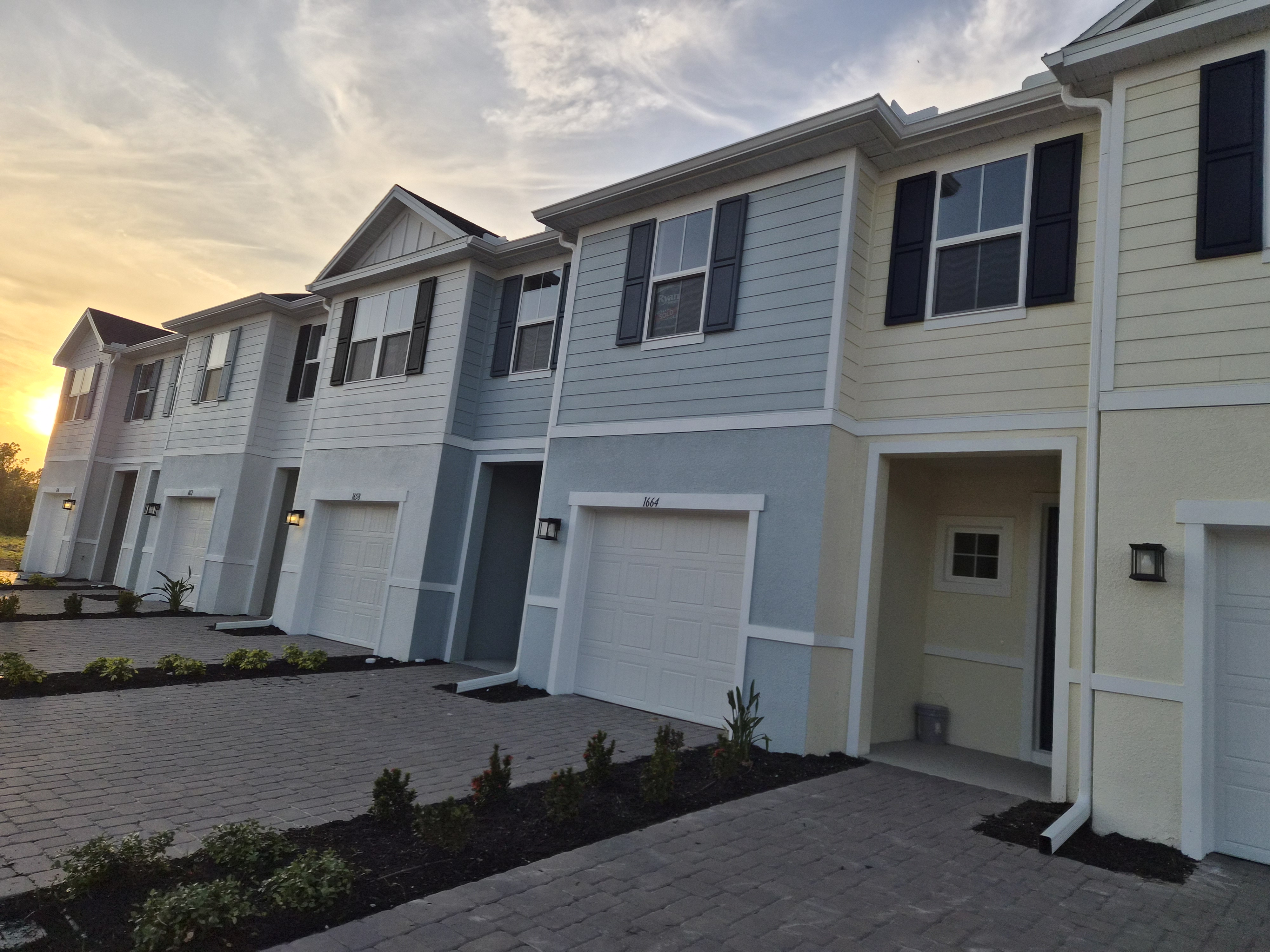 Townhouse community with seamless gutter installation by M12 Gutters